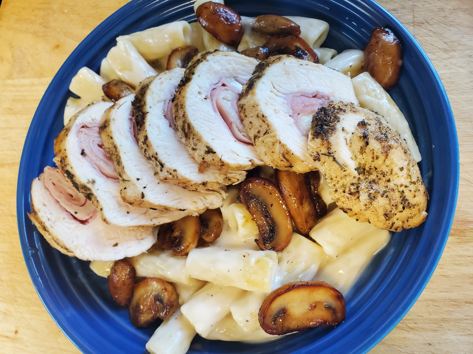 stuffed-chicken-with-sauteed-mushrooms-and-parmesan-cream-pasta